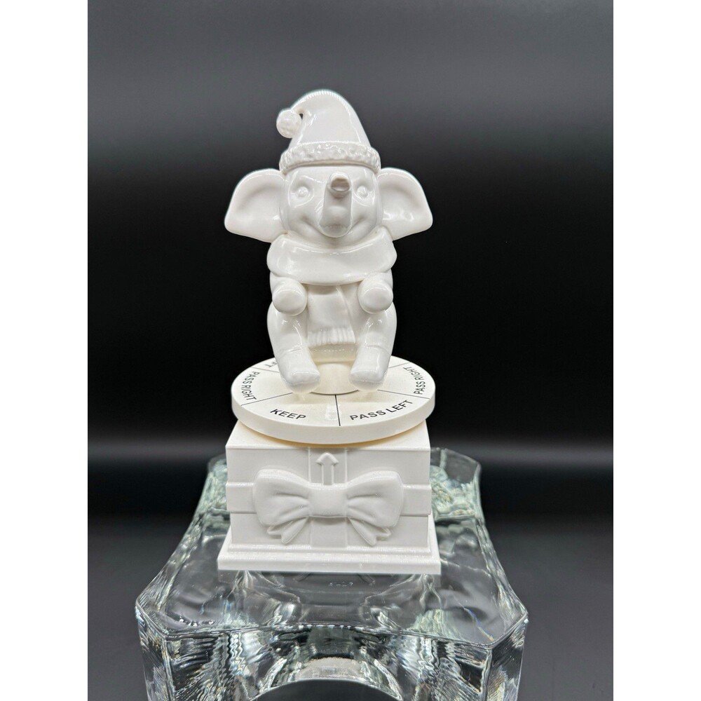 White elephant spinner for gift giving game